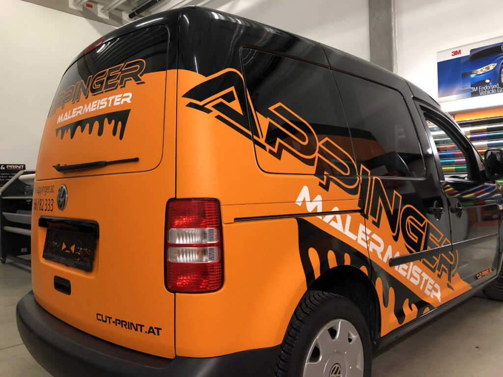 cut_print_Unsere_Werke_1 Fahrzeugfolierung Orange Schwarz Appinger Malermeister